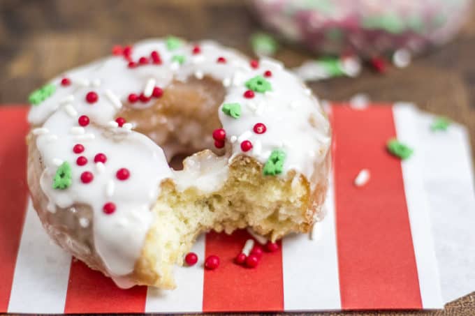 Classic Sour Cream Doughnuts fried to perfection with a classic powdered sugar glaze just like at Krispy Kreme! No yeast makes these doughnuts easy to make and with festive sprinkles a fantastic Holiday brunch/party treat!