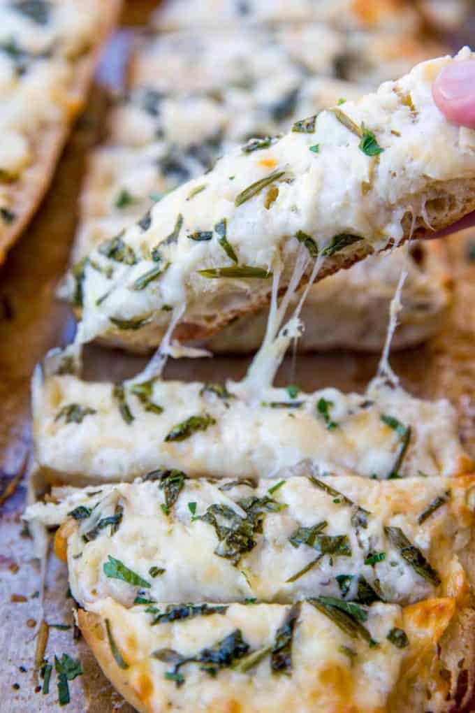 We LOVE this Spinach Artichoke Dip Cheesy Bread