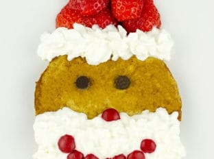 Delicious homemade Gingerbread Pancakes dressed up as Santa! Quick, easy, and so cute!