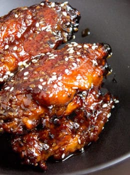 Sticky Asian chicken wings made with a hoisin take on a Mongolian beef marinade. They're sweet, savory, garlicky, just plain awesome and basically begging to be made for your Superbowl party!