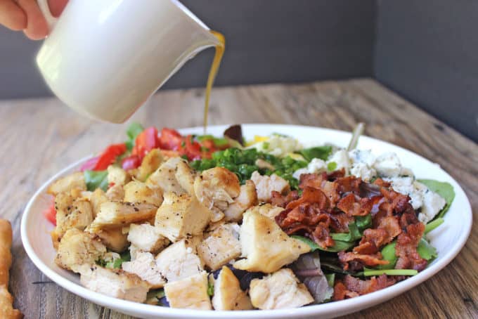 Cosi Cobb Salad with grilled chicken, bacon, eggs, gorgonzola and more topped with Cosi's signature Sherry Shallot Vinaigrette dressing.