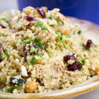 One pot Moroccan Chicken, Couscous and Vegetables is a quick dinner that is done in less than 30 minutes. Healthy, full of warm spices with burst of bright flavor from the cranberries and lemon juice.