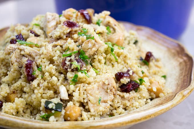 One pot Moroccan Chicken Couscous with Vegetables is a quick dinner that is done in less than 30 minutes. Healthy, full of warm spices with burst of bright flavor from the cranberries and lemon juice.