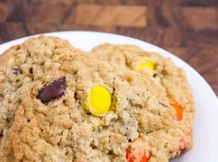 Chewy, crispy Oatmeal Reese's Peanut Butter Cookies are rich and moist dessert, a perfect addition to your lunchbox or even as a morning snack.