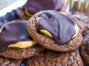 Crispy, chewy, rich Buckeye Brownie Cookies topped with a sweetened peanut butter topping and semisweet chocolate is the perfect chocolate peanut butter combo!