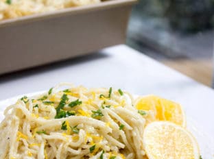 Creamy Parmesan Lemon Baked Pasta made with just 5 ingredients (plus salt, pepper and olive oil)! Crispy on top and creamy inside with fresh lemon juice and lemon zest on top. dinnerthendessert.com