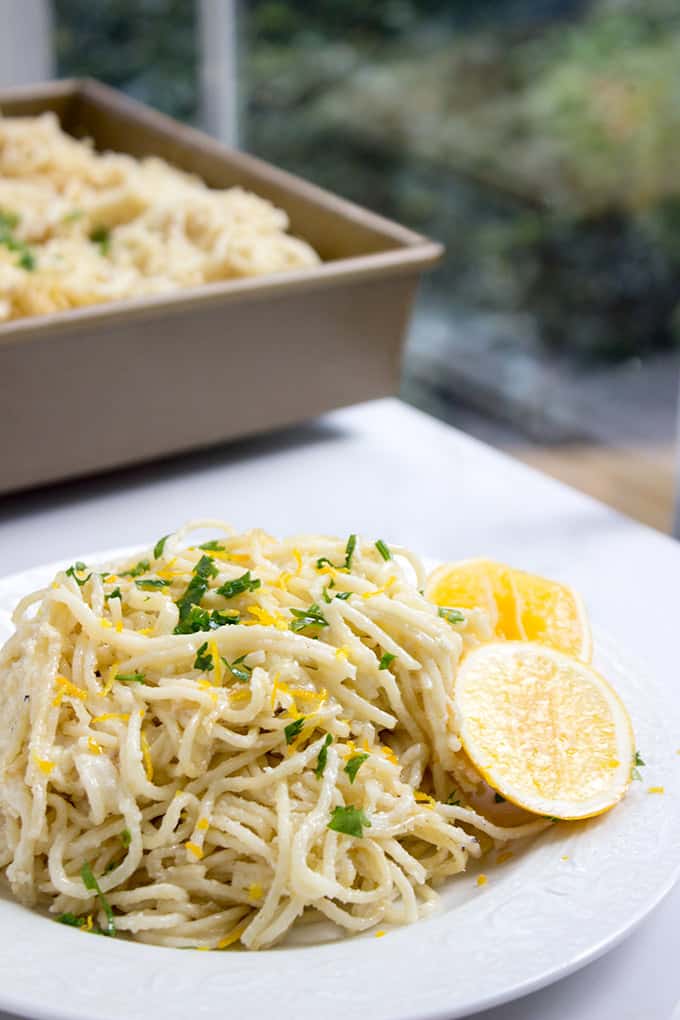 Creamy Parmesan Lemon Baked Pasta made with just 5 ingredients (plus salt, pepper and olive oil)! Crispy on top and creamy inside with fresh lemon juice and lemon zest on top. dinnerthendessert.com