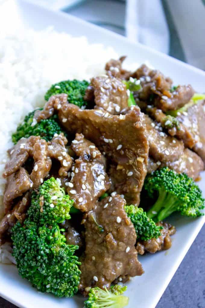 A Panda Express Beef and Broccoli delicious spot-on copycat with tender stir fried flank steak and steamed broccoli in a classic ginger soy sauce.