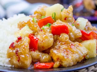 This copycat Panda Express Sweetfire Chicken Breast dish is made with crispy chicken with garlic, red bell peppers, onions and pineapples in a sweet and spicy chili sauce. A spot on copy!