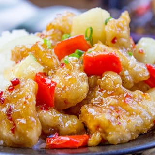 This copycat Panda Express Sweetfire Chicken Breast dish is made with crispy chicken with garlic, red bell peppers, onions and pineapples in a sweet and spicy chili sauce. A spot on copy!