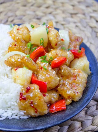 This copycat Panda Express Sweetfire Chicken Breast dish is made with crispy chicken with garlic, red bell peppers, onions and pineapples in a sweet and spicy chili sauce. A spot on copy!