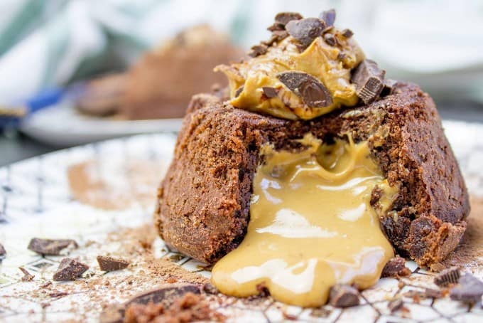 The perfect Peanut Butter Chocolate Molten Lava Cake and the whole darn thing is just 6 ingredients! Includes 5 alternate non peanut butter flavor ideas.