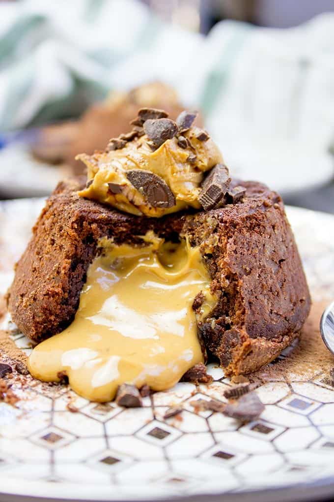 The perfect Peanut Butter Chocolate Molten Lava Cake and the whole darn thing is just 6 ingredients! Includes 5 alternate non peanut butter flavor ideas.
