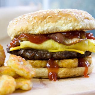 Carl's Jr. Breakfast Burger with seared beef patty, crispy hash browns, scrambled eggs, cheese and glorious bacon. All the flavor, no drive-thru.