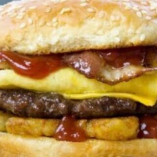 Burger with cheese, bacon and egg