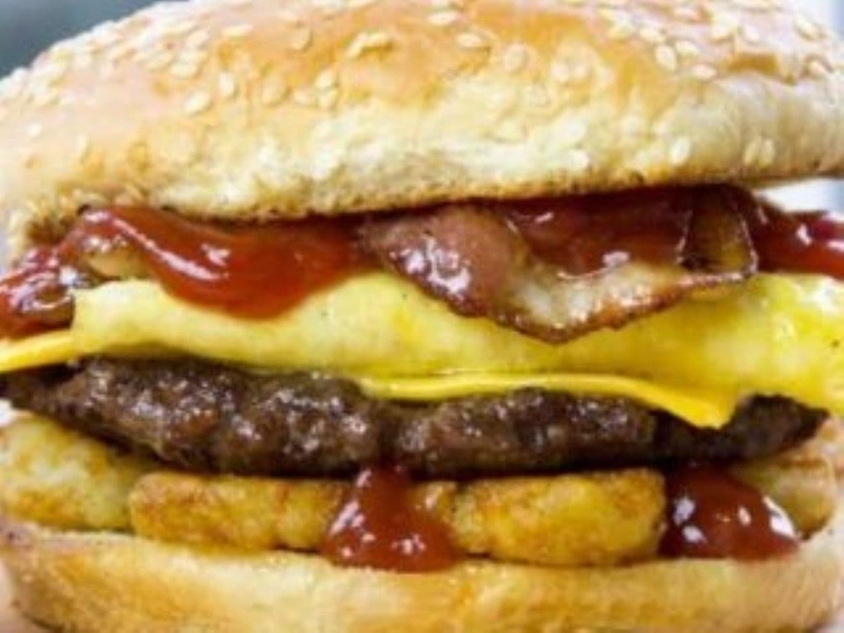 Burger with cheese, bacon and egg