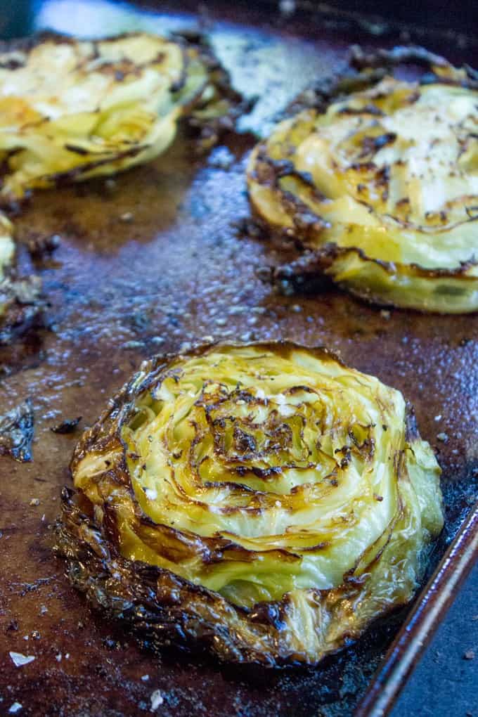 Crispy Roasted Cabbage Steaks make a great side dish for any meal (not just your favorite Corned Beef) in just 20 minutes. You'll never boil cabbage again.