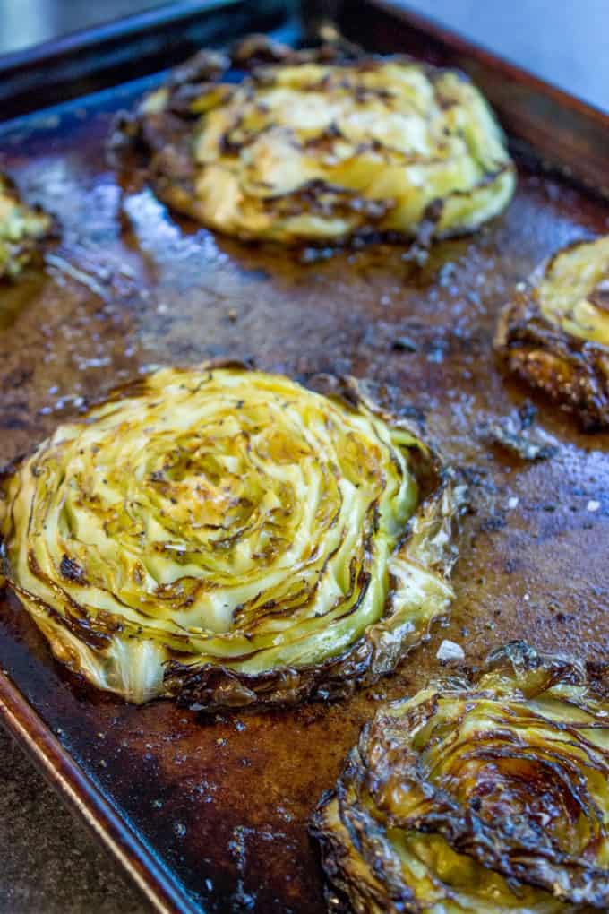 Crispy Roasted Cabbage Steaks make a great side dish for any meal (not just your favorite Corned Beef) in just 20 minutes. You'll never boil cabbage again.