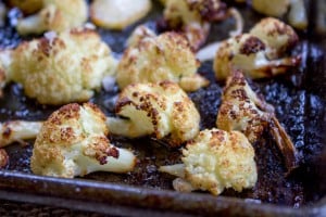 Crispy Roasted Cauliflower is a quick side dish that is versatile enough to stand alone or be used as a topping in pastas, salads or on pizzas. The perfect easy roasted vegetable.