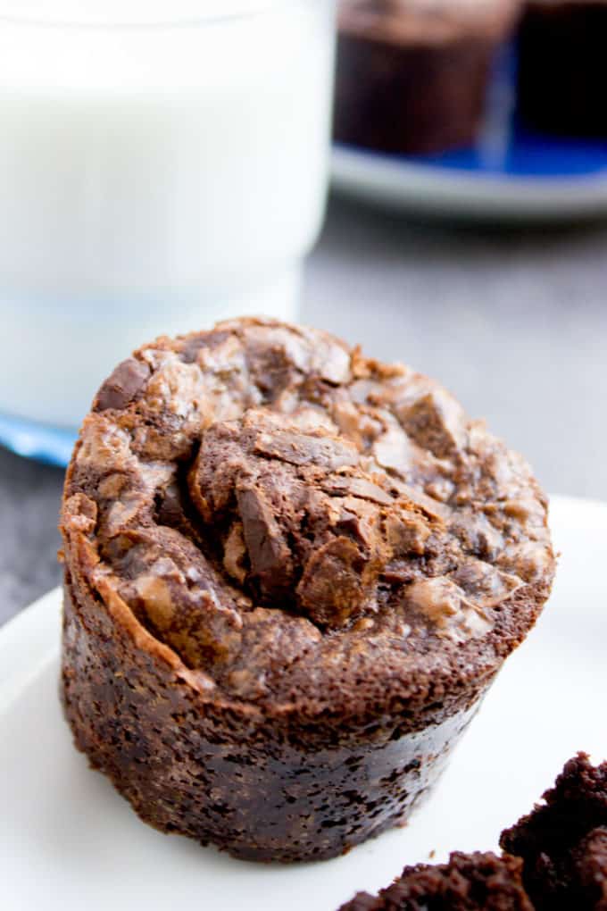 Easy Dark Chocolate Chunk Brownies on a plate with a glass of milk