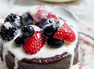 Flourless Mocha Cake with Creme Anglaise will leave your guests thinking it came from a bakery or restaurant. Dense mocha cake with vanilla cream is like the best coffee and cream dessert you've ever had.