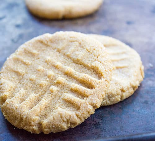 Flourless Peanut Butter Cookies with just 4 Ingredients Total! One bowl, one whisk and some delicious, amazing Peanut Butter cookies.