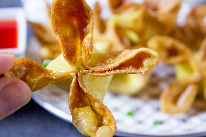 Panda Express Cream Cheese Rangoon made with a creamy center and crispy exterior, these are the perfect appetizer for your next Chinese takeout meal. You can make ahead and freeze for later too.