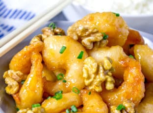 Panda Express Honey Walnut Shrimp are fried with a tempura batter and quickly tossed in a honey sauce and sweetened walnuts.