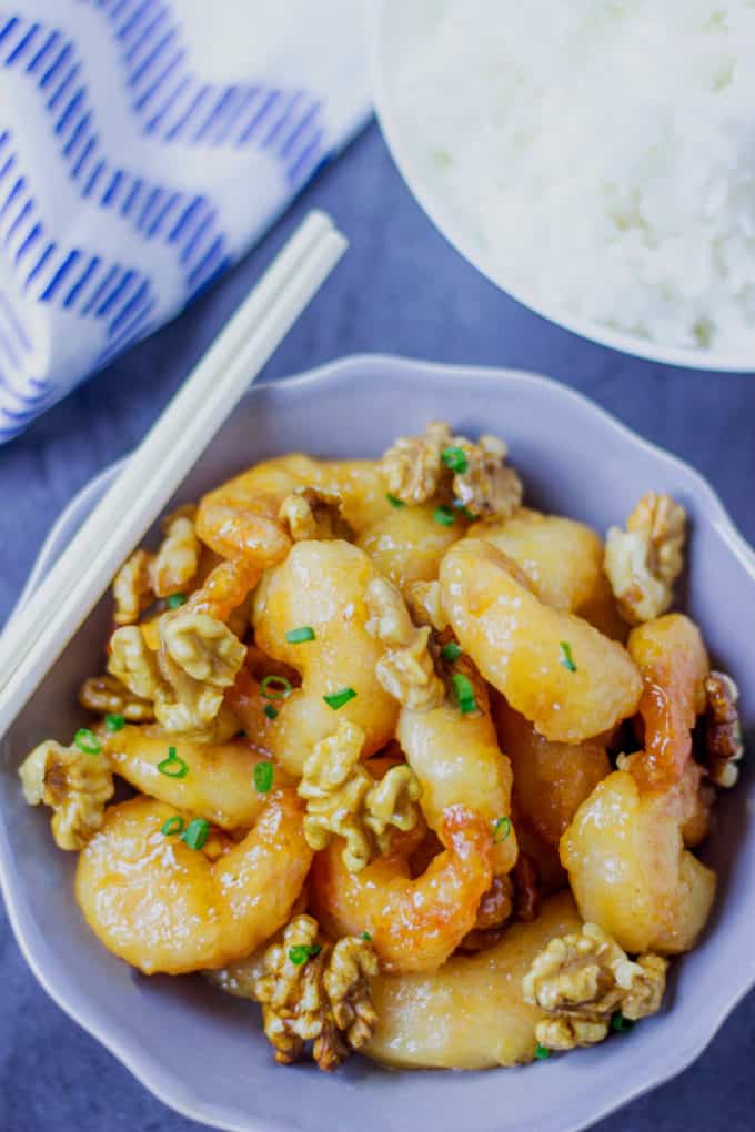 Panda Express Honey Walnut Shrimp are fried with a tempura batter and quickly tossed in a honey sauce and sweetened walnuts. 