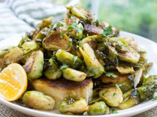 Tin Roof Bistro Brussels Sprouts are caramelized and tossed in a lemony caper butter sauce. The most popular item on the menu will make anyone a fan!