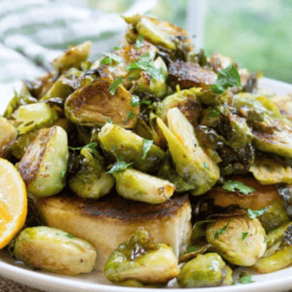 Brussels on a white plate with lemon