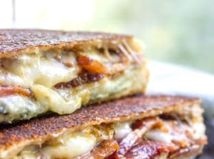 Fig and Bacon Grilled Cheese, otherwise known as The Figgy Piggy is a grilled cheese sandwich with homemade fig spread, bleu cheese, provolone and thick cut bacon.