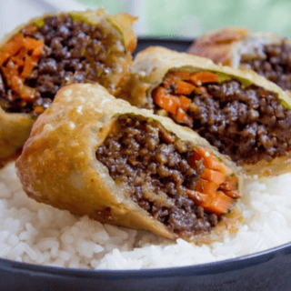Rolls served on bowl of rice