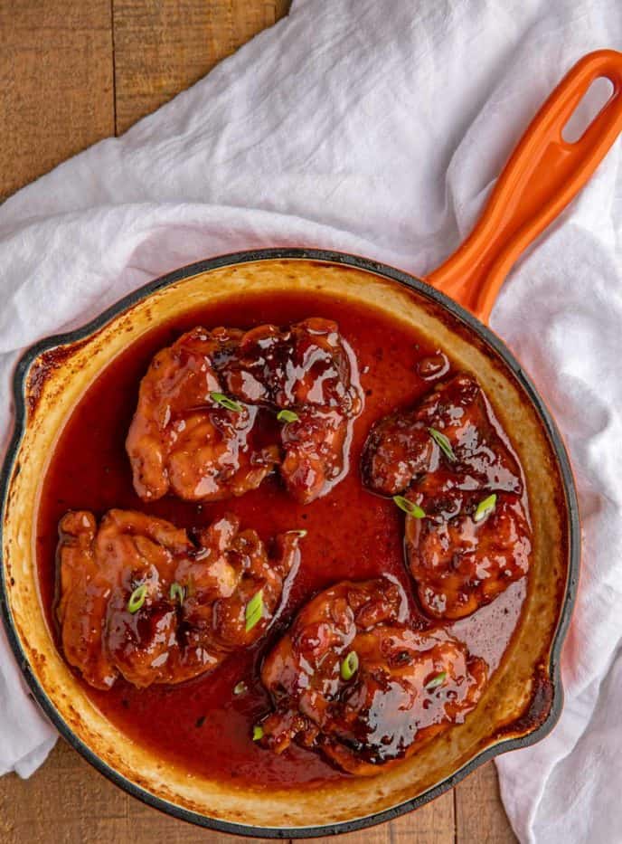 Sweet and Spicy Baked Chicken in orange pan