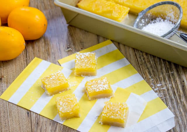 Trader Joe's Classic Lemon Bars have a crispy buttery crust with a sweet and sour lemon filling.
