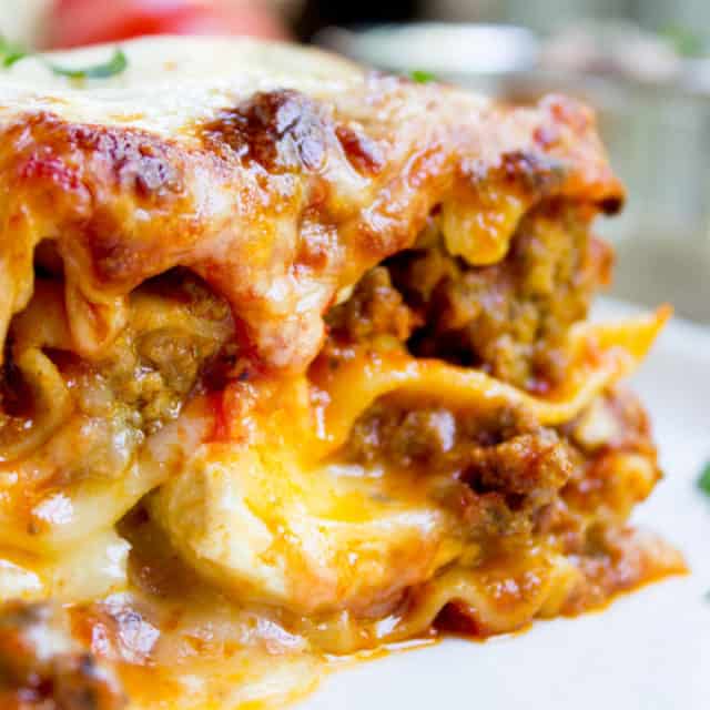 Ultimate Meat Lasagna with four cheeses, a homemade marinara sauce and a few quick chef tricks will make you feel like you've ordered lasagna at your favorite Italian Restaurant.