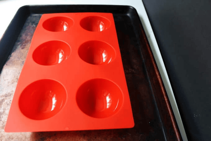 Dessert mold on a baking sheet