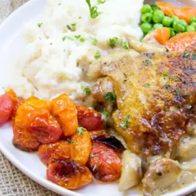 plate of chicken and veggies