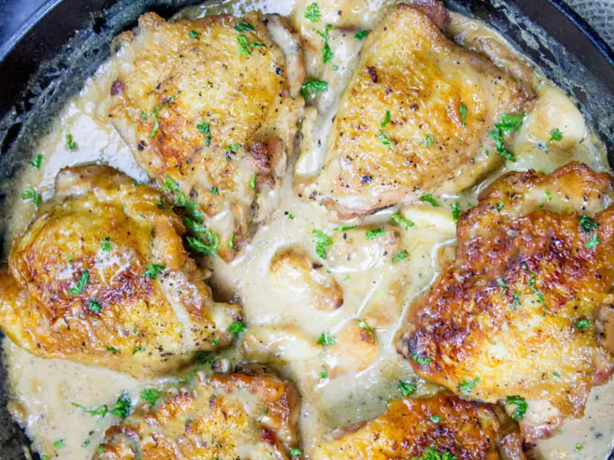 chicken and sauce in the cast iron 