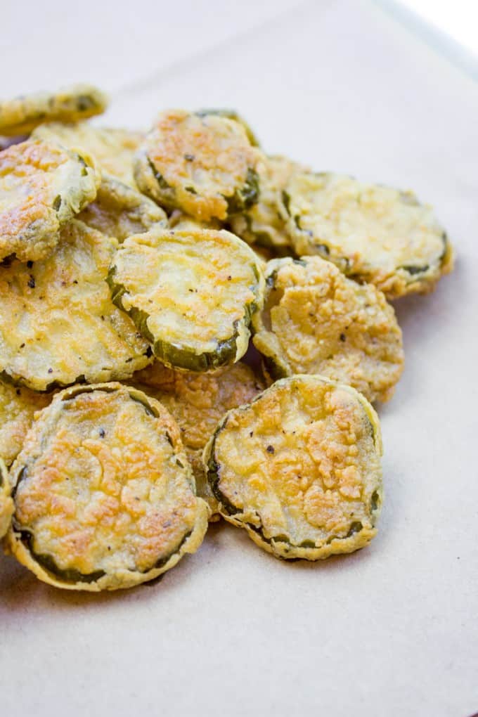 Fried Pickles made with sliced dill pickles breaded in seasoned flour and fried crispy are a fun side dish to add to your bbq plate and take just a few minutes to make.