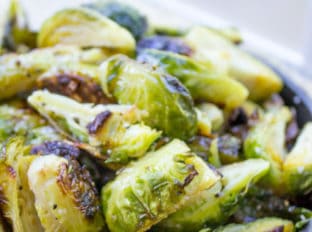 Oven Roasted Brussels Sprouts are an easy side dish for your favorite weeknight meal and they're delicious enough that everyone will be fighting over the last helping.