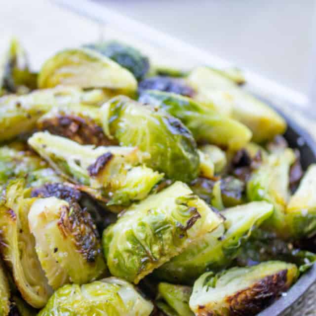 Oven Roasted Brussels Sprouts are an easy side dish for your favorite weeknight meal and they're delicious enough that everyone will be fighting over the last helping.