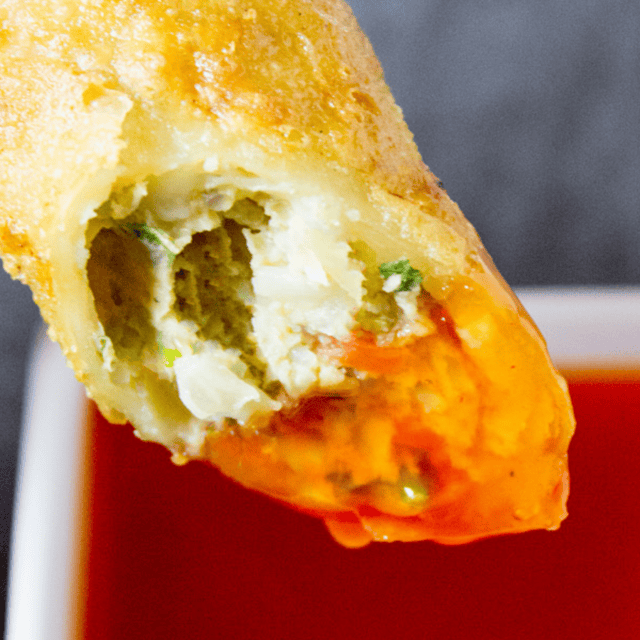 Close up of sauce on egg roll