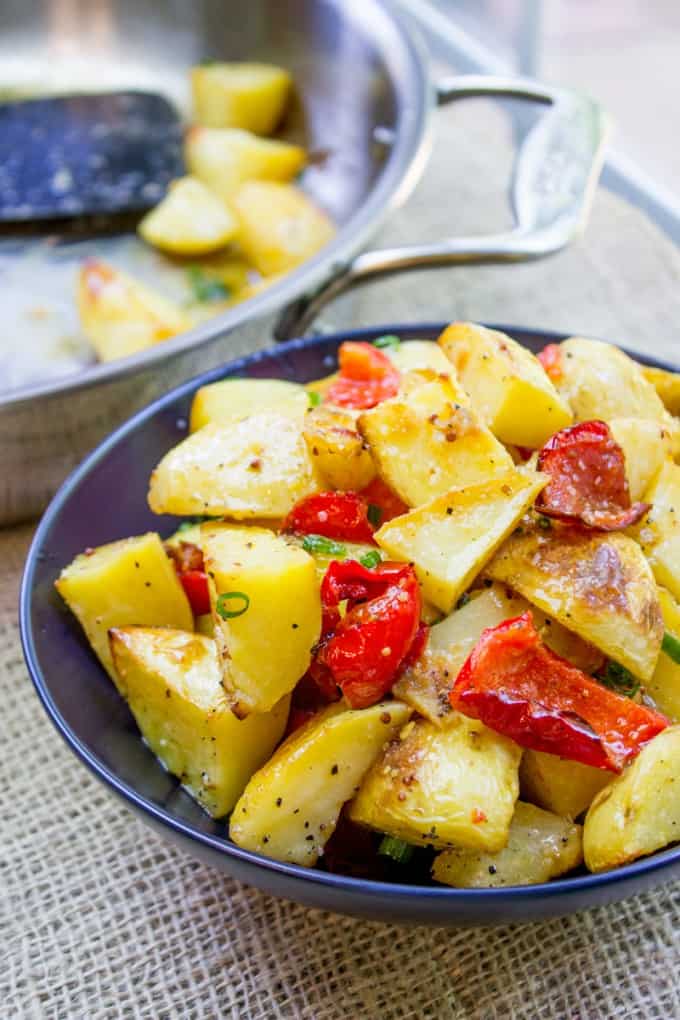 Roasted Potato Salad with Dijon Vinaigrette is the perfect summery side dish to you BBQ menu with just five ingredients!