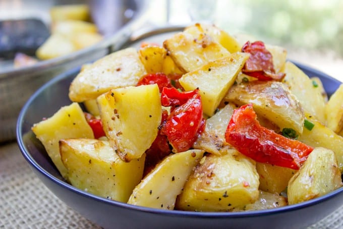 Roasted Potato Salad with Dijon Vinaigrette is the perfect summery side dish to you BBQ menu with just five ingredients!