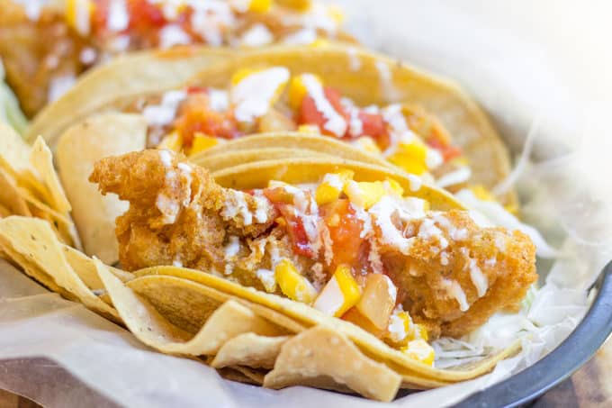 Beer Battered Crispy Fish Tacos with Mango Habanero Salsa are crunchy, fresh, sweet and spicy. A breeze to make and perfect for the summer!