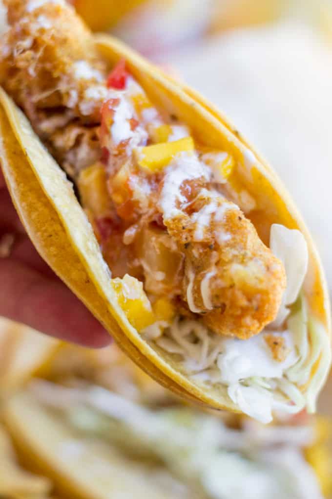 Beer Battered Crispy Fish Tacos with Mango Habanero Salsa are crunchy, fresh, sweet and spicy. A breeze to make and perfect for the summer!
