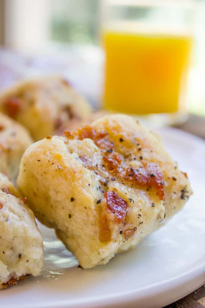 Black Pepper Bacon Biscuits are peppery, full of delicious bacon, cream cheese and buttermilk, they are fluffy and flaky. The perfect biscuit for your weekend brunch!