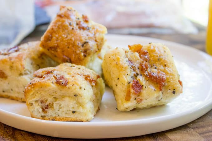 Black Pepper Bacon Biscuits are peppery, full of delicious bacon, cream cheese and buttermilk, they are fluffy and flaky. The perfect biscuit for your weekend brunch!