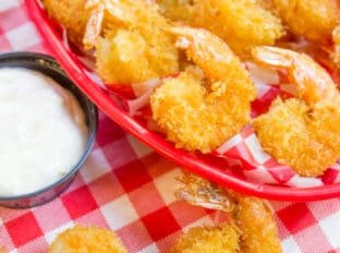 Classic Fried Shrimp made with panko keeps your shrimp light, crispy and not weighed down with a heavy wet batter. Don't pay huge bucks for fried frozen shrimp that taste like cardboard, fresh fried shrimp is just minutes away!